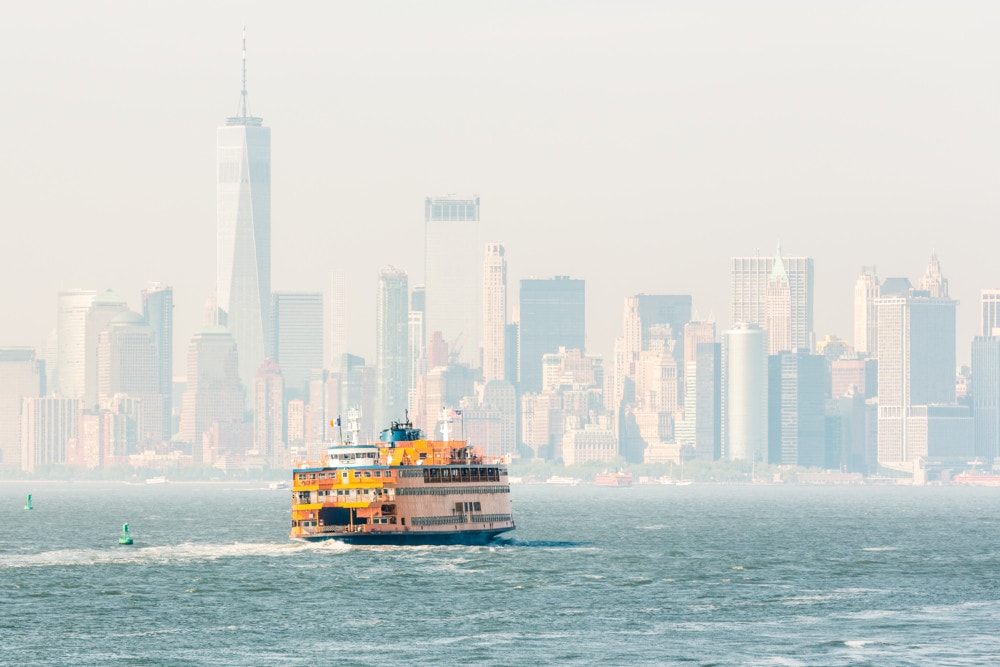 Staten Island Ferry and Lower Manhattan Skyline, New York City, USA.